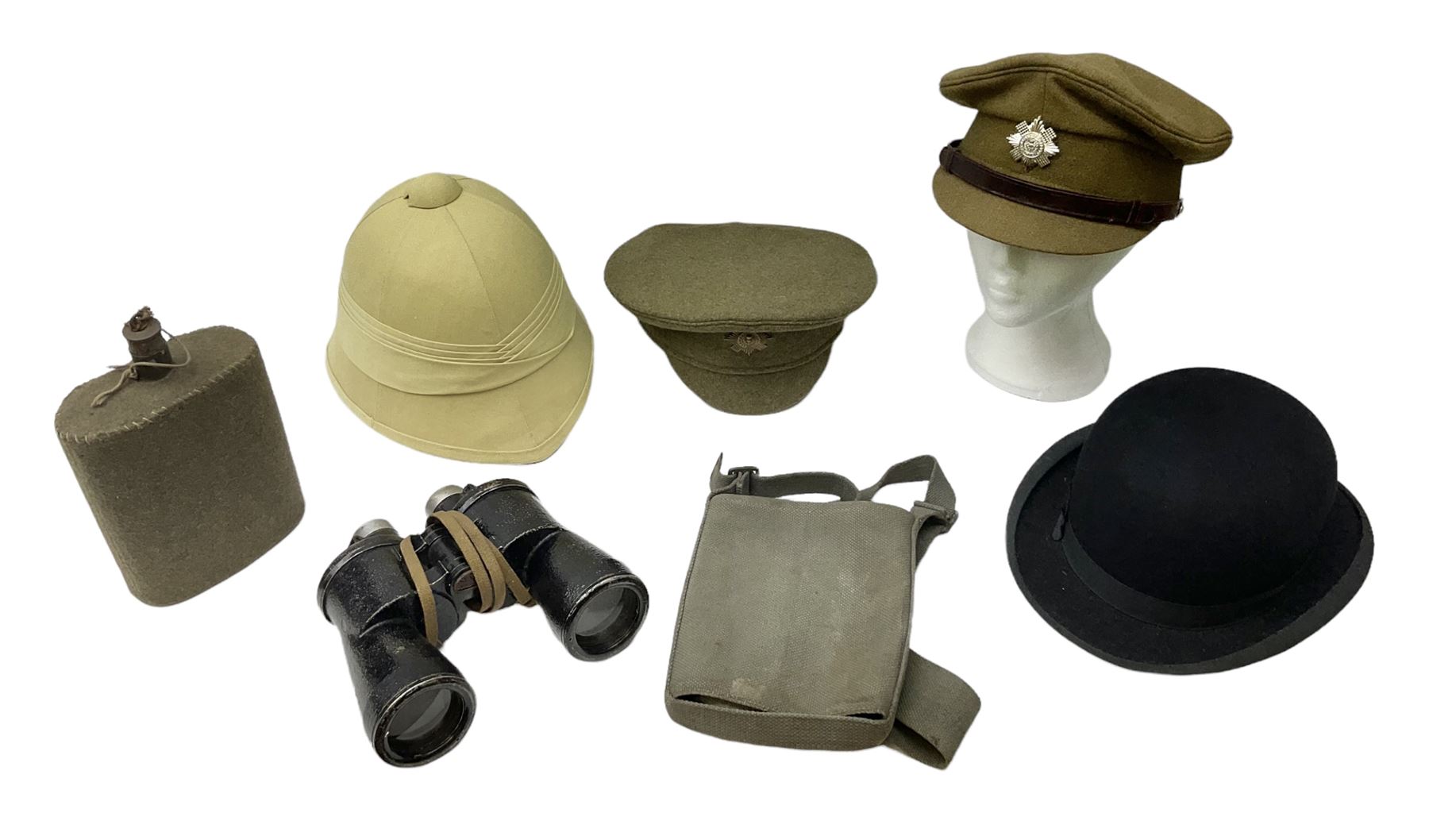 Early 20th century British army peaked cap with Scots Guards brass badge; another later with Scots Guards Staybrite badge; modern pith helmet; British army water bottle with later webbing cover; pair of Carl Zeiss blc 7 x 50 binoculars; and Dunn & Co bowler hat