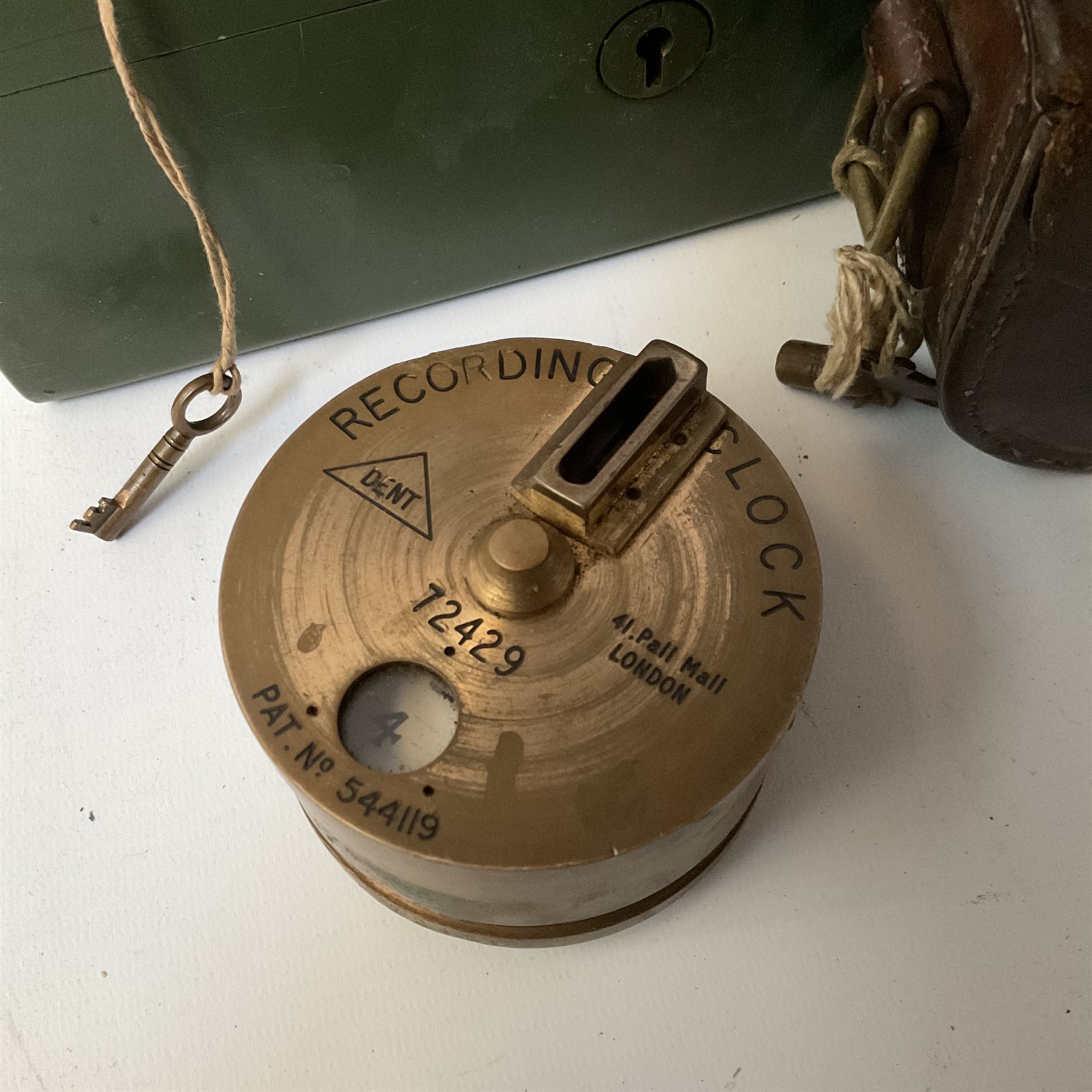 Metal cash box with key and removable tray,  together with recording clack, PAT No.544119, box L25.5cm, D18cm