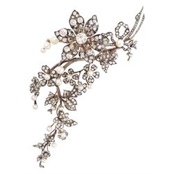 19th century gold and silver diamond and pearl en tremblant detachable brooch, the flower tremblant with a principal old cut diamond of approx 1.90 carat, the petals and stamen set with old cut and rose cut diamonds, total diamond weight approx 9.10 carat, to a foliate spray set set with further rose cut diamond and white / pink / cream pearls and ribbon tie