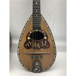 Italian bouzouki type long necked mandolin with segmented lute back and spruce top with tortoiseshell style panels; bears label 'Miroglio & Figli Sicilia Catania Italia' L99cm; and Italian lute back mandolin with segmented back and spruce top bearing label for F. De Mureda Napoli (2)