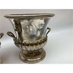 Pair of silver plated wine coolers, of campagna form, the bodies of part fluted form with twin fruiting vine modelled handles, upon spreading circular feet, H21cm rim D21cm