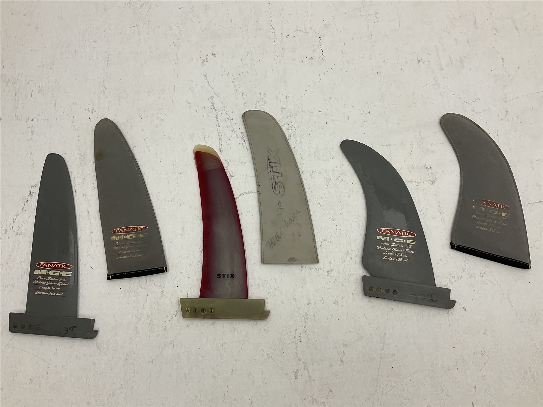 Windsurfing: Quantity of fins to include Freewave MFC, Stix Wildthang, Ultra Profile Sails G 10 fin, F-HOT Finz, Fanatic M.G.E slalom, North Shore Maui Hawaii etc (13)