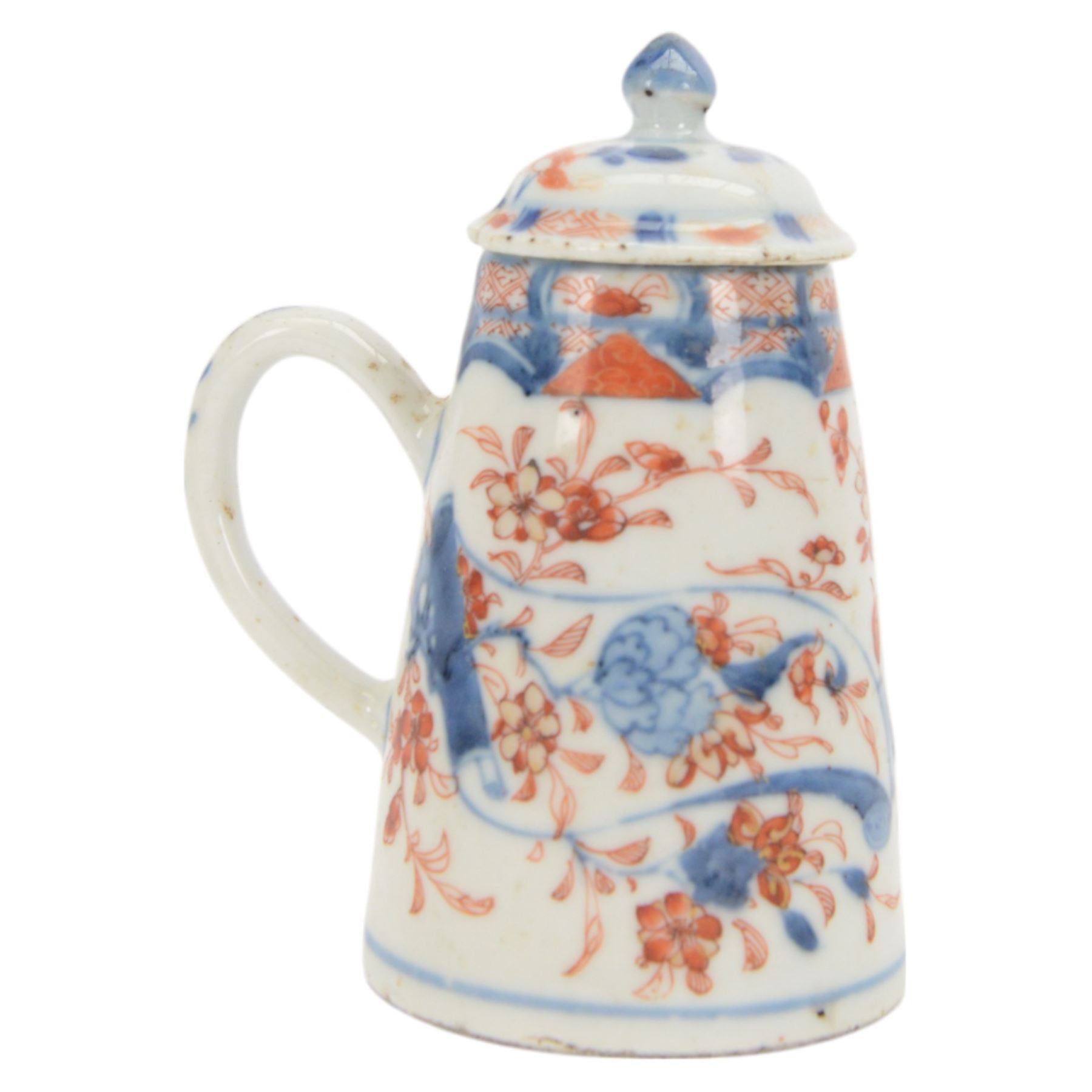 18th century Chinese Imari coffee or chocolate pot, of tapering cylindrical form with side handle, and domed cover with knop finial, painted with a vase of flowers upon a table and scroll, amongst blossoming flowers, H12cm 