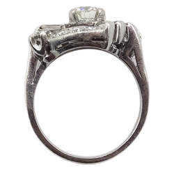  American platinum round and baguette cut diamond asymmetric spray marquise shaped ring, circa 1950's, stamped 10% Irid Plat, central diamond approx 0.7 carat  