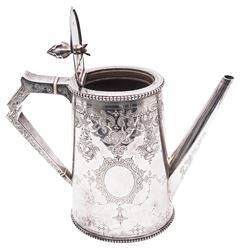 Victorian silver coffee pot, of tapering oval form with straight spout, bud finial to hinged cover and angular handle with two ivory insulators, engraved with two vacant oval panels, floral and fruit baskets, birds and foliate scrolling detail, the body with beaded border to upper and lower edge, hallmarked 
Goldsmiths Alliance Ltd, London 1869, H21.5cm, approximate weight 30.73 ozt (855.9 grams)

This item has been registered for sale under Section 10 of the APHA Ivory Act 