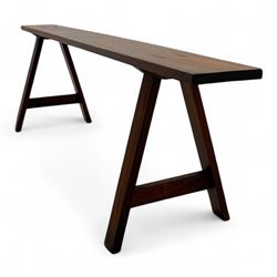 Early 20th-century Arts and Crafts style cherry wood single plank bench on A-frame trestle supports 