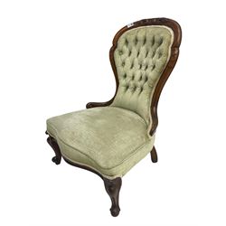 Victorian walnut framed nursing chair, upholstered in buttoned laurel green fabric with sprung seat, raised on cabriole supports