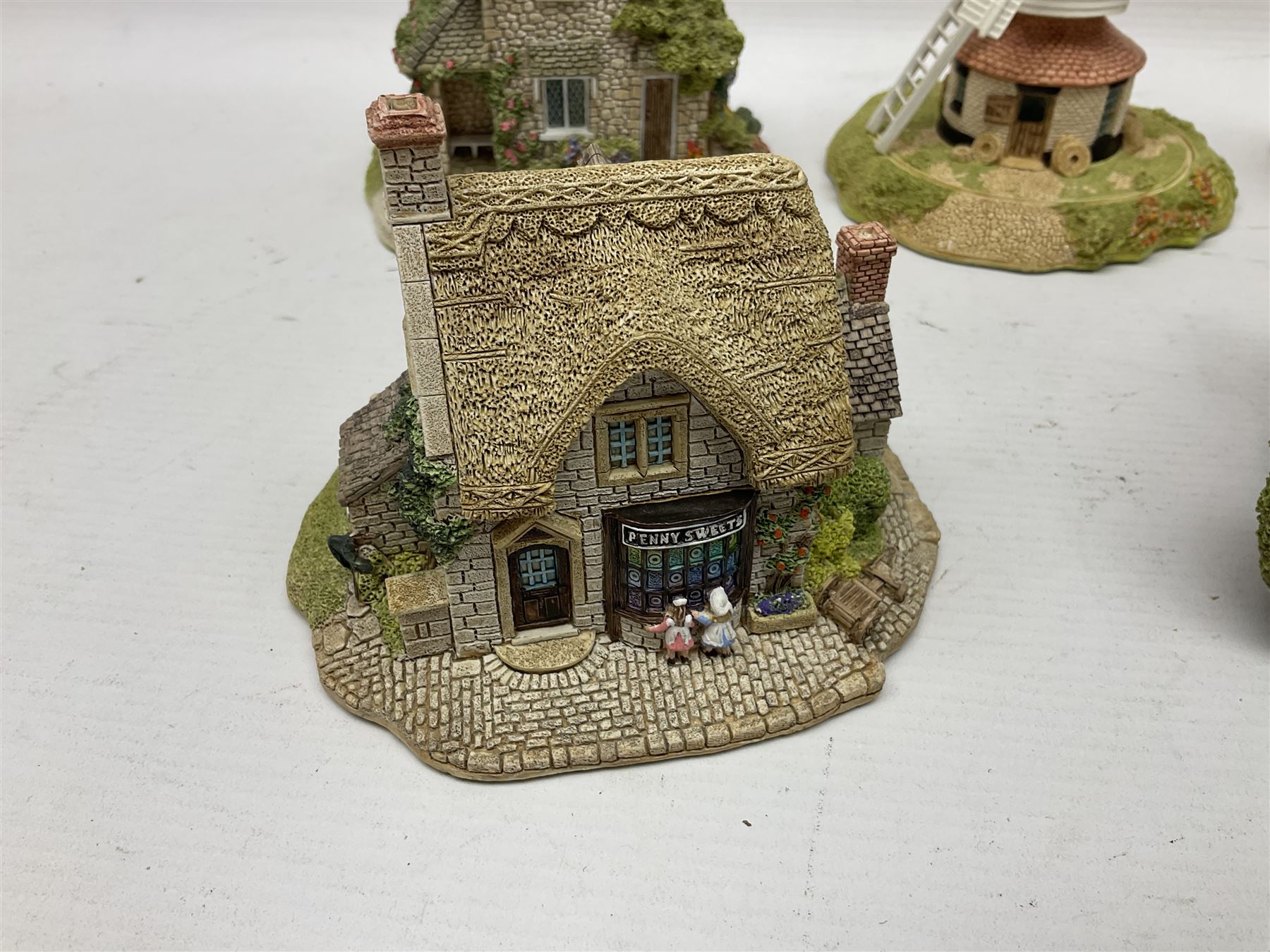 Twenty Lilliput Lanes, including The Chocolate House, Chiltern Mill, Blaise Hamlet, St Kevin Church, some with deeds and original boxes