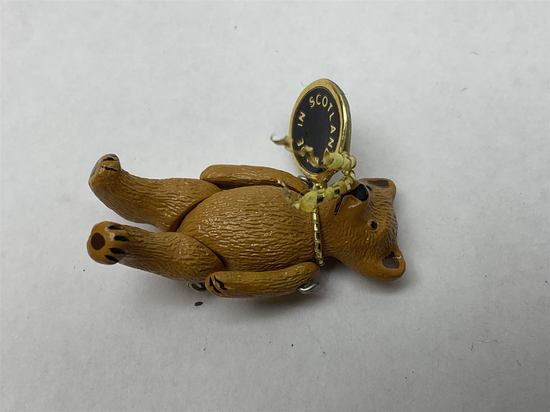 Seven Hantel miniature articulated pewter teddy bears, including bride and groom 