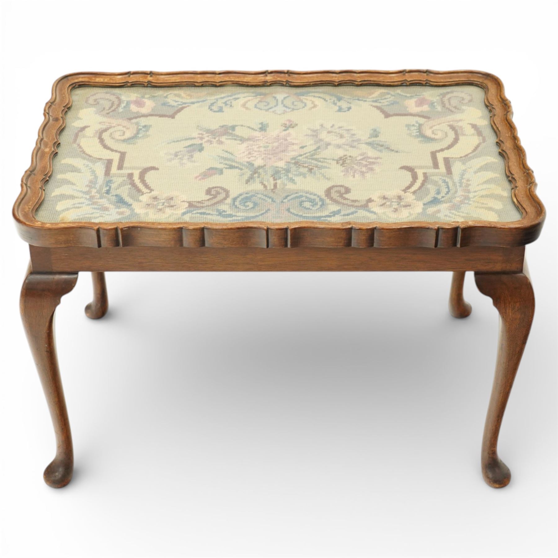 Georgian style occasional table with glazed needlework top, with pie crust edge, raised on cabriole supports