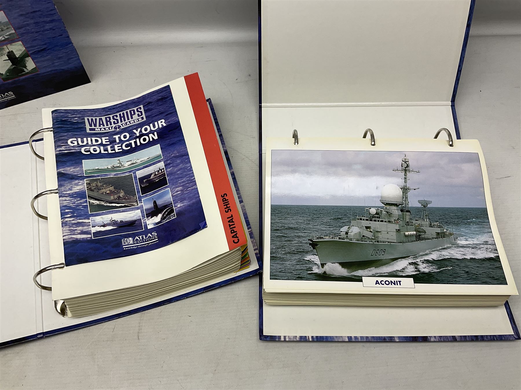 Six Atlas Editions ring binders of Warships Maxi Cards; and large quantity of booklets, cigarette cards etc of naval and shipping interest