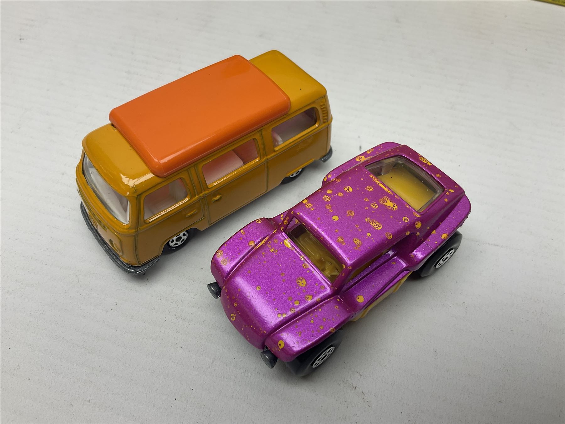 Matchbox 1-75 Series 'Superfast' ex-shop stock - eight models comprising 22d Freeman Intercity Commuter, 23e Volkswagen Camper, 29d Racing Mini, 30d Beach Buggy, 32d Maserati Bora, 34d Formula 1 Racing Car, 36d Hot Rod Draguar and 40d Vauxhall Gildsman 1; all boxed; and an unboxed 31d Volksdragon (9)