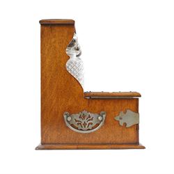 Victorian brass mounted oak tantalus, containing a set of three decanters, fitted with a games compendium to the front, H32cm