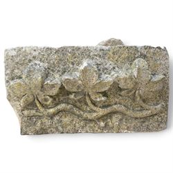 Two 18th century carved sandstone architectural elements, comprising a substantial square pedestal block with recessed panelled facias (W42cm H45cm); and a frieze fragment carved in relief with three stylised flowerheads and an undulating foliate stem (W30cm H18cm)