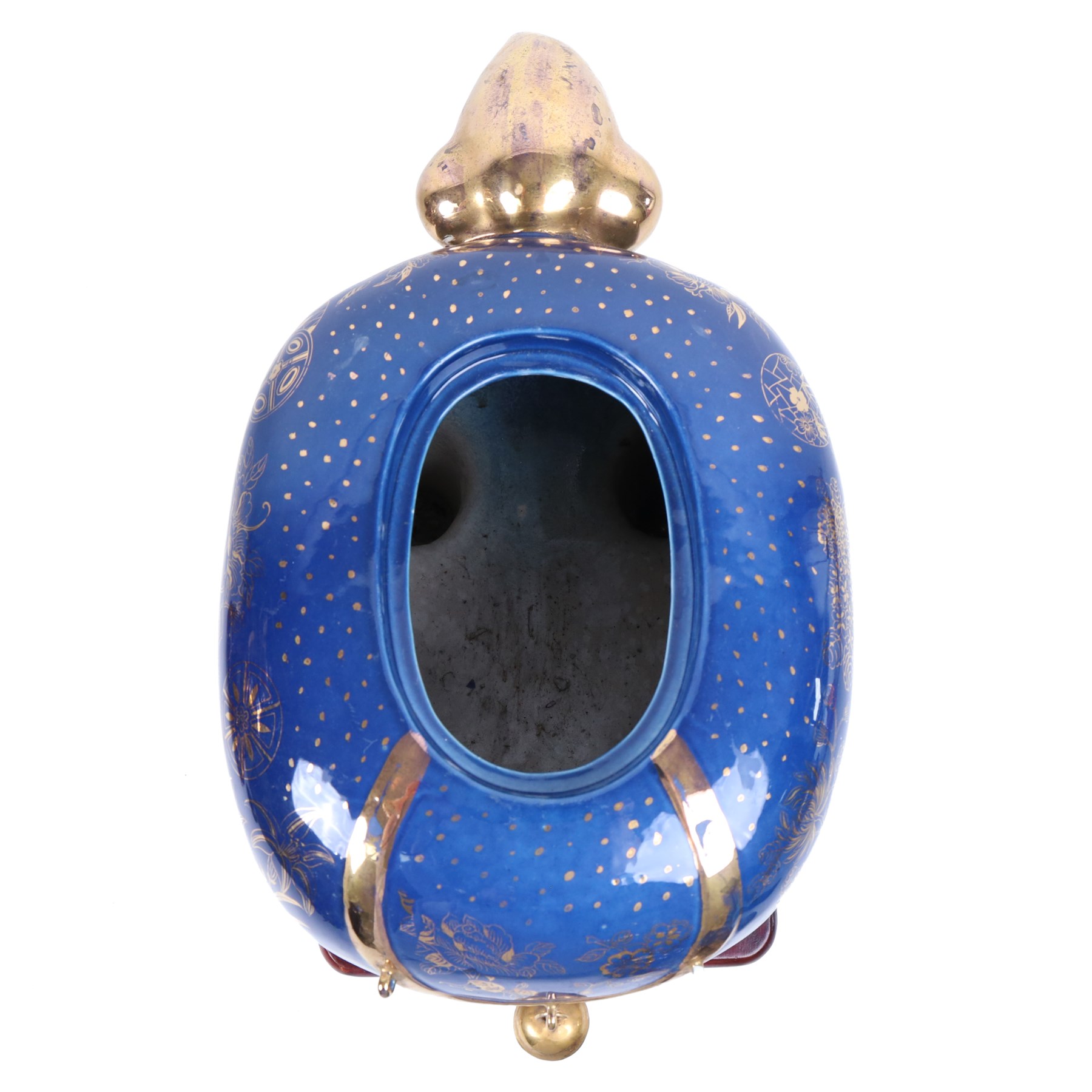 Pair of 20th century foo dog incense burners, decorated with gilt flowers and insects upon a blue ground, on wooden stands, H58cm 