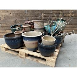 Large collection of ceramic plant pots and paving slabs, (26)