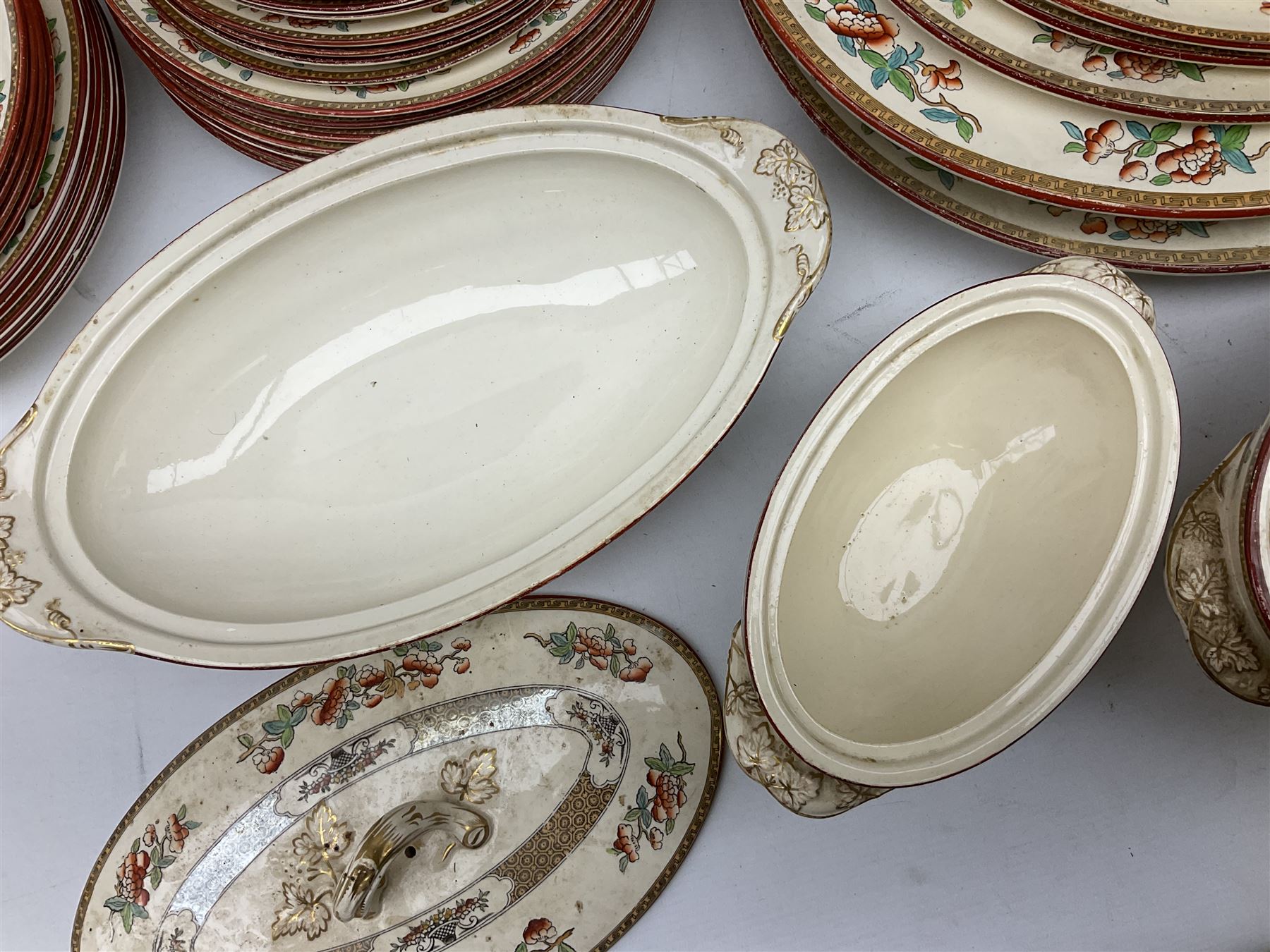 Victorian Copeland Spode Indian Tree pattern dinner service, to include sixteen dinner plates, fifteen side plates, eleven soup bowls in two sizes, four covered tureens of various forms, eight serving platters of various sizes etc  (74)