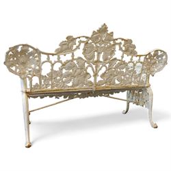 Coalbrookdale design - early 20th century cast iron oak leaf and acorn bench, white painted cast iron frame with slatted wooden seat, the pierced and shaped back decorated with scrolling oak branches and leafage, flanked by dog mask arm terminals over cabriole supports with paw feet 