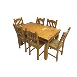 Traditional pine dining table, rectangular top on square supports (W130cm D75cm H75cm); and set six pine chairs with rush seats (W42cm H95cm)