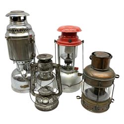 Copper and brass ship’s lamp marked ‘Anchor’, H25cm, Feuer hand storm lantern, Bialaddin Model 315 paraffin lamp and an Anchor lamp (4)