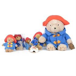 Six Paddington Bear soft toys, including Rainbow Designs  and larger plush example, largest H