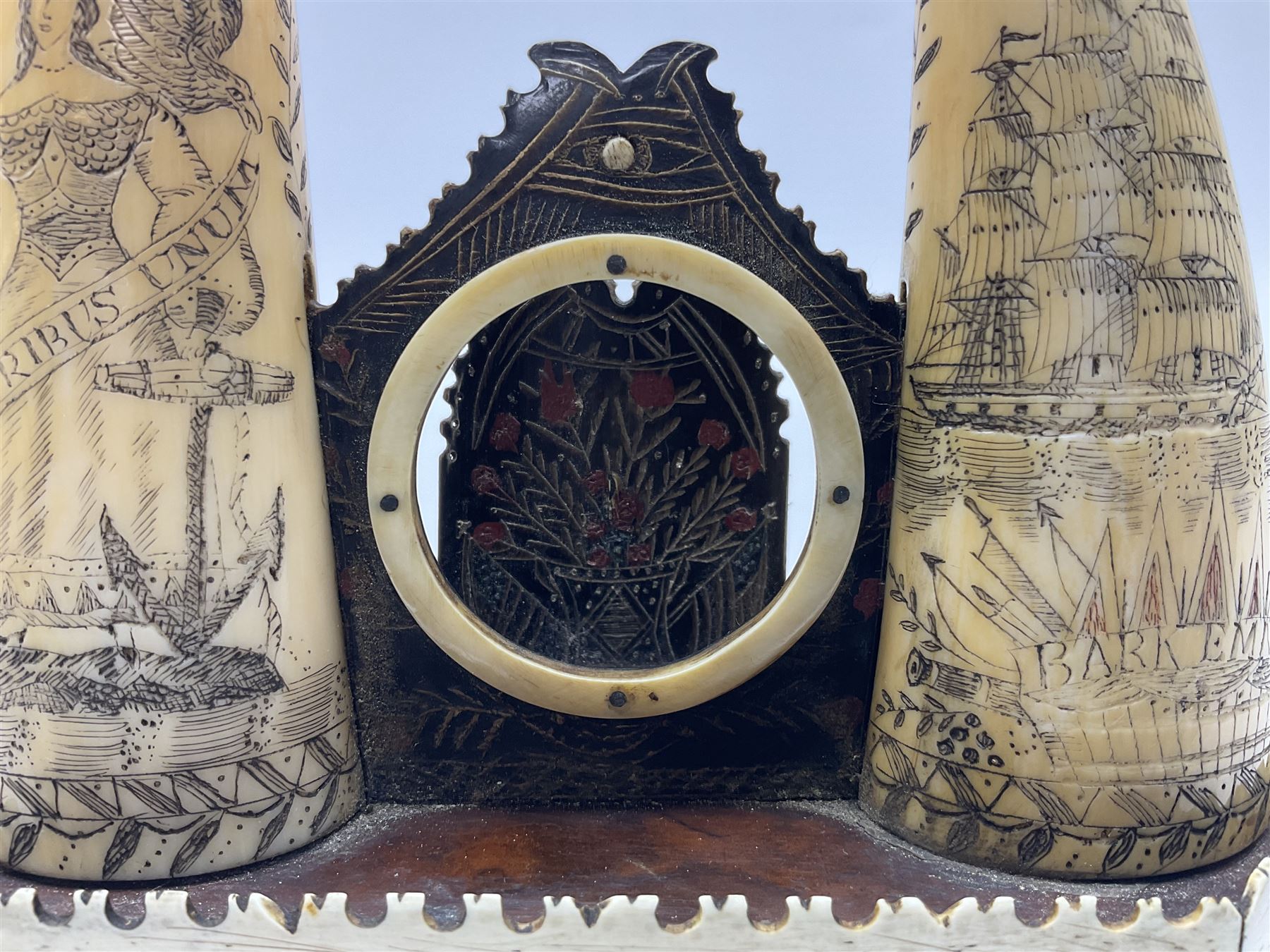19th century scrimshaw pocket watch stand with two sperm whales teeth and central baleen watch holder; etched for the sailing ship 'Emma' at Warren Rhode Island and dated 1852, H14cm Notes: Warren was an active whaling port from the mid 18th century and became the leading whaling port of Rhode Island in the early 19th century, sending on average twenty whalers per year. The last whaler departed from Warren in 1865, following the decline of the whaling industry. 