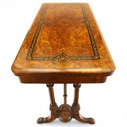 Victorian walnut and inlaid games table, rectangular fold-over top with figured walnut veneers and foliate inlay, swivel and fold over to reveal a green baize lined playing surface, on twin supports united by a stretcher, raised on scroll carved feet with castors (extended 96cm x 92cm)