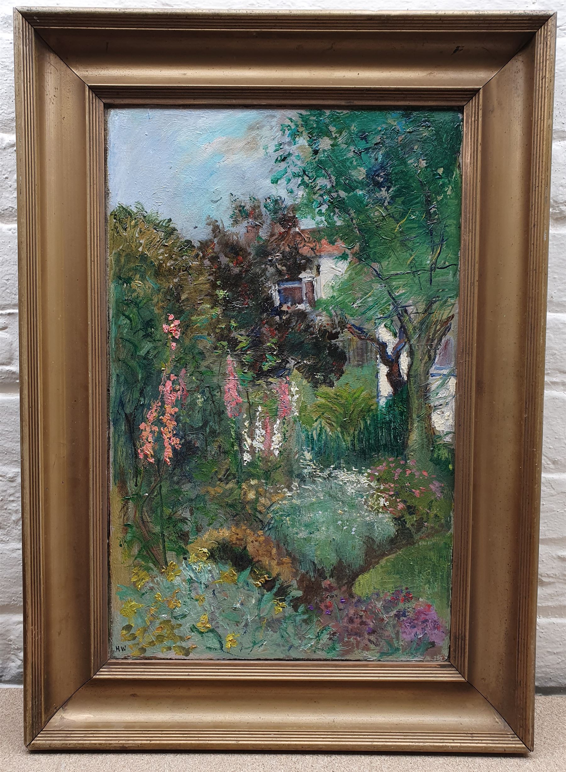 H W (British mid 20th century): Cottage Garden, oil on canvas signed with initials 56cm x 35cm