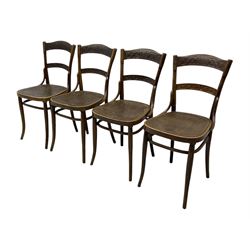Jacob & Josef Kohn - set of four early 20th century Austrian bentwood chairs, each with carved decoration to the shaped backrest and shaped seat, on splayed supports with stretchers, marked with the manufacturer's stamp and paper label beneath