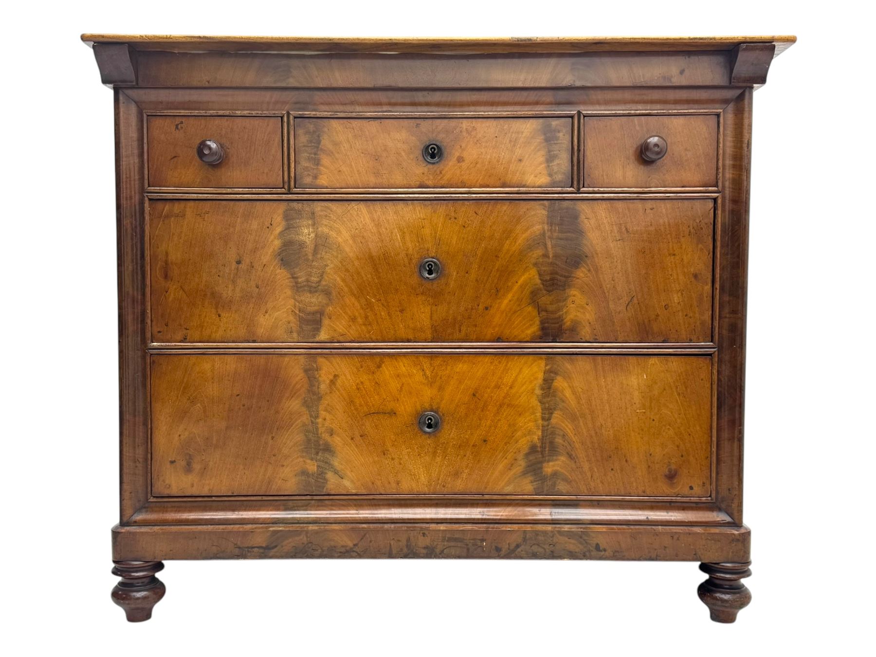19th century French figured mahogany and walnut chest, rectangular top over three short and two long drawers, on turned feet
