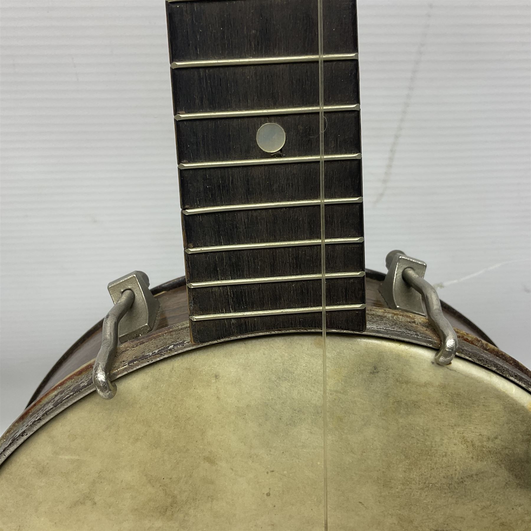 George Formby banjolele with metal plaque to headstock L55cm; in carrying case with instruction booklet.
