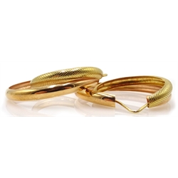 Pair of 18ct gold double hoop ear-rings stamped 750, 7.62gm
