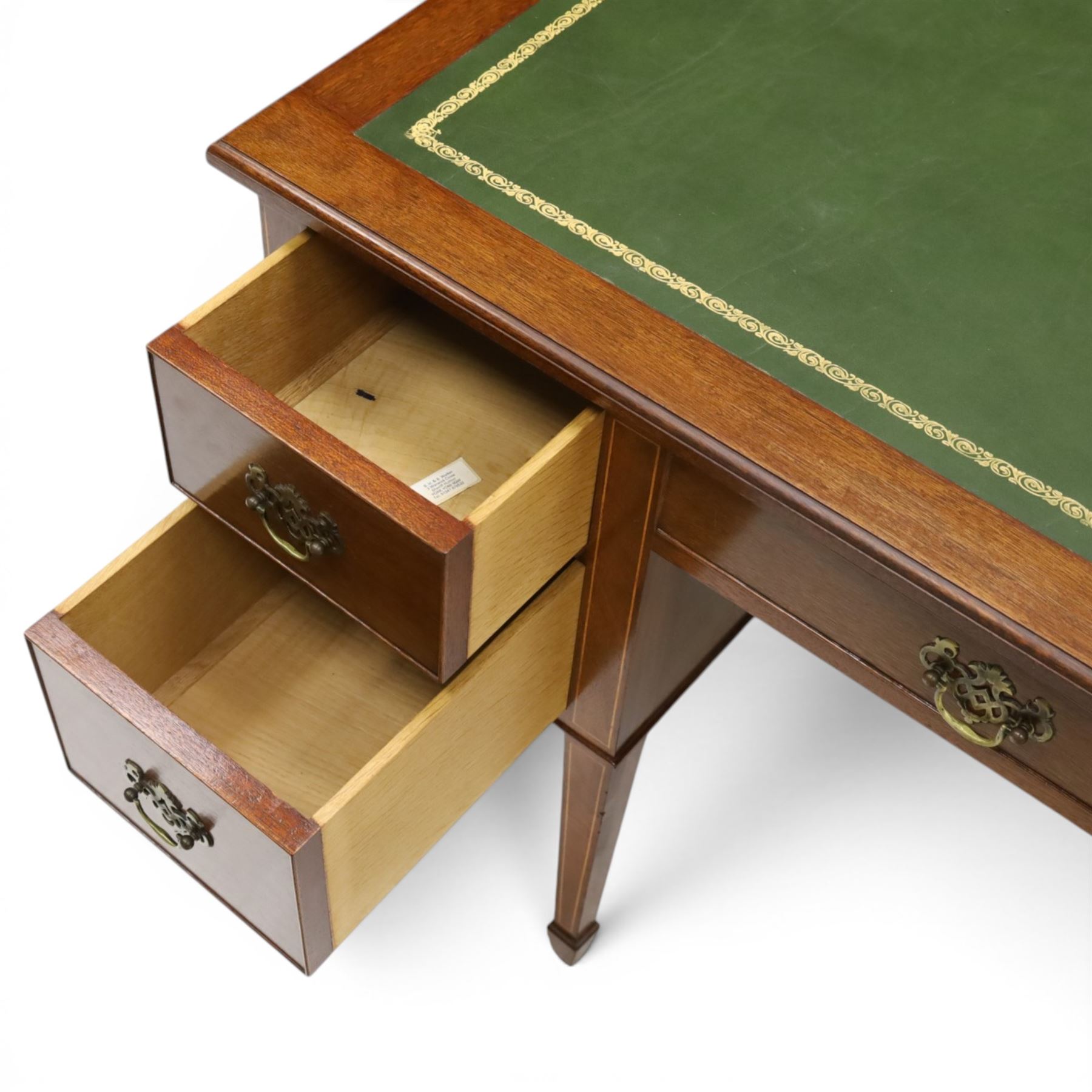 Acornman - Edwardian style mahogany kneehole desk, rectangular top with inset tooled green leather writing surface, central frieze drawer flanked by two further drawers either side, on square tapering inlaid supports terminating in spade feet, with signature carved acorn, by the workshop of Alan Grainger of Brandsby