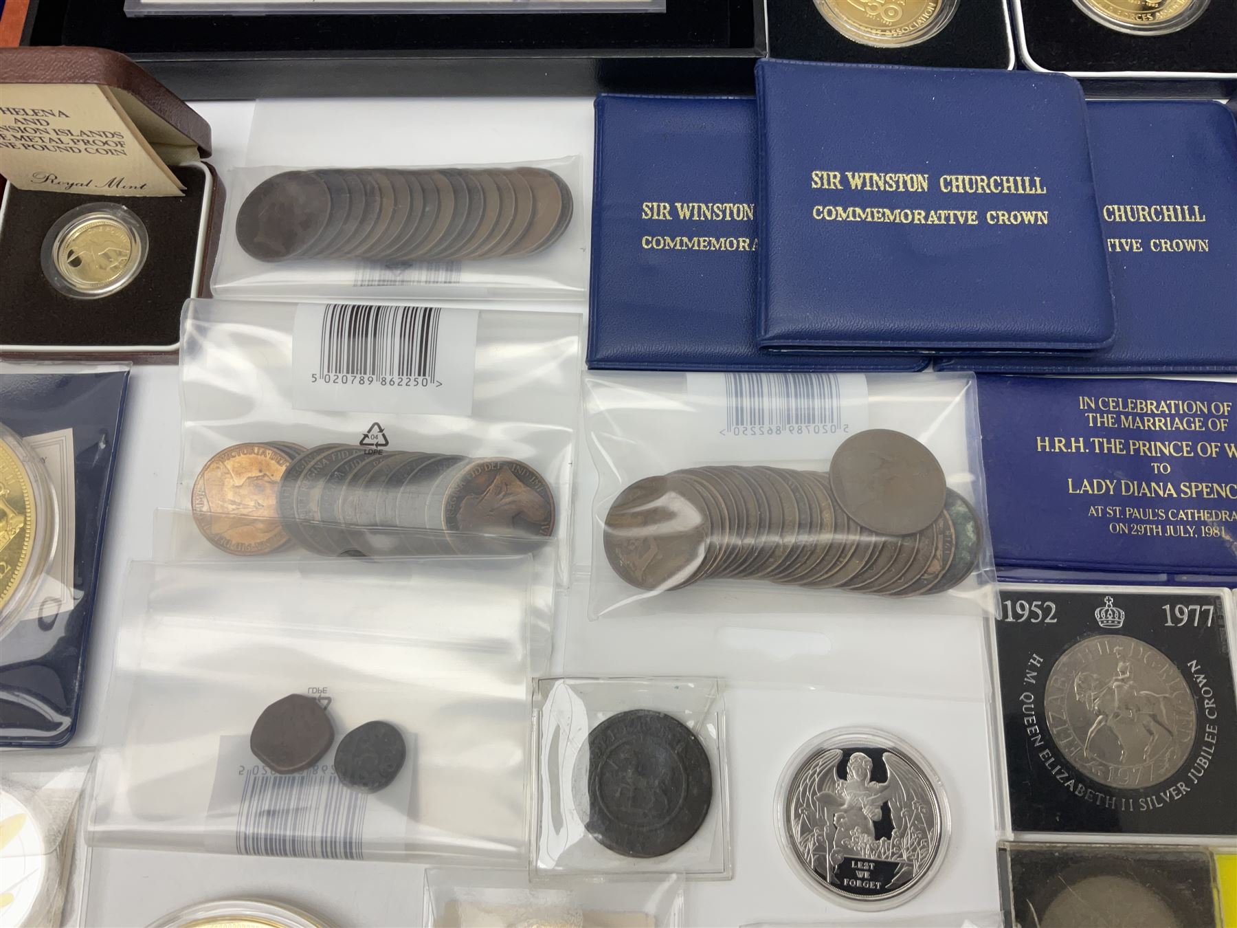 Mostly commemorative and fantasy coinage including commemorative crowns, 2018 'The Capsule Edition featuring the 2018 Paddington 50p coins' in display case, The Royal Mint Solomon Islands 2007 one ounce fine silver five dollars coin on card etc