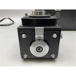 Yashica-A camera body, serial no. A4080073, with 'Yashikor 1:3.5 f=80mm' lens, serial no. 209272 and 'Yashikor 1:3.5f=80mm' lens, serial no 22942, together with Yashica TL-Electro camera body, serial no. 5054162 with 'Yashinon-DS 50mm 1:1.9  40056038