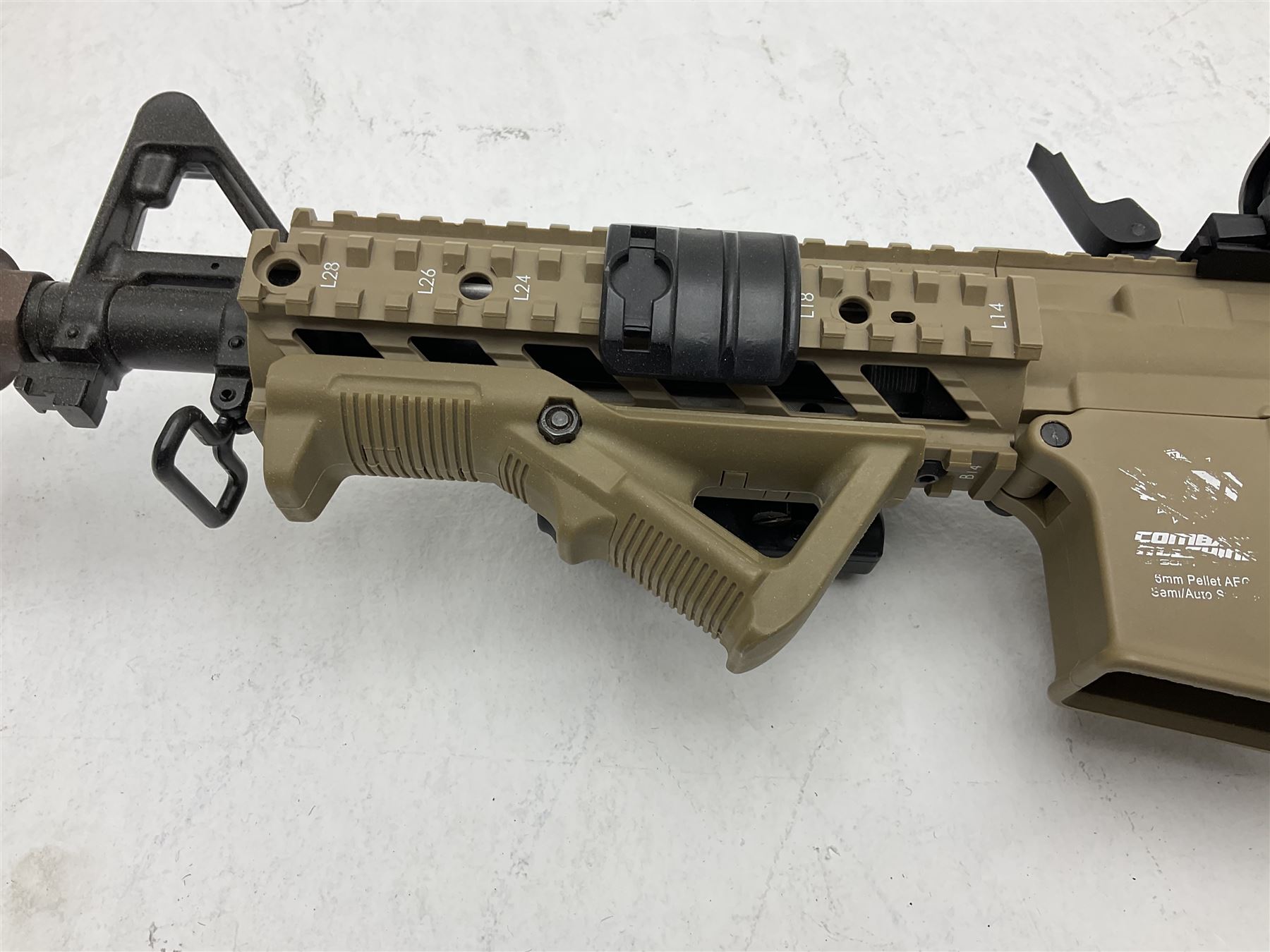 Combat Machine lithium battery powered airsoft BB rifle, 'Complete AEG Series' to fire 5mm pellets, with adjustable length stock L69cm non-extended; with six magazines, Trijicon ACOG red dot telescopic sight, battery charger etc (NO BATTERIES)