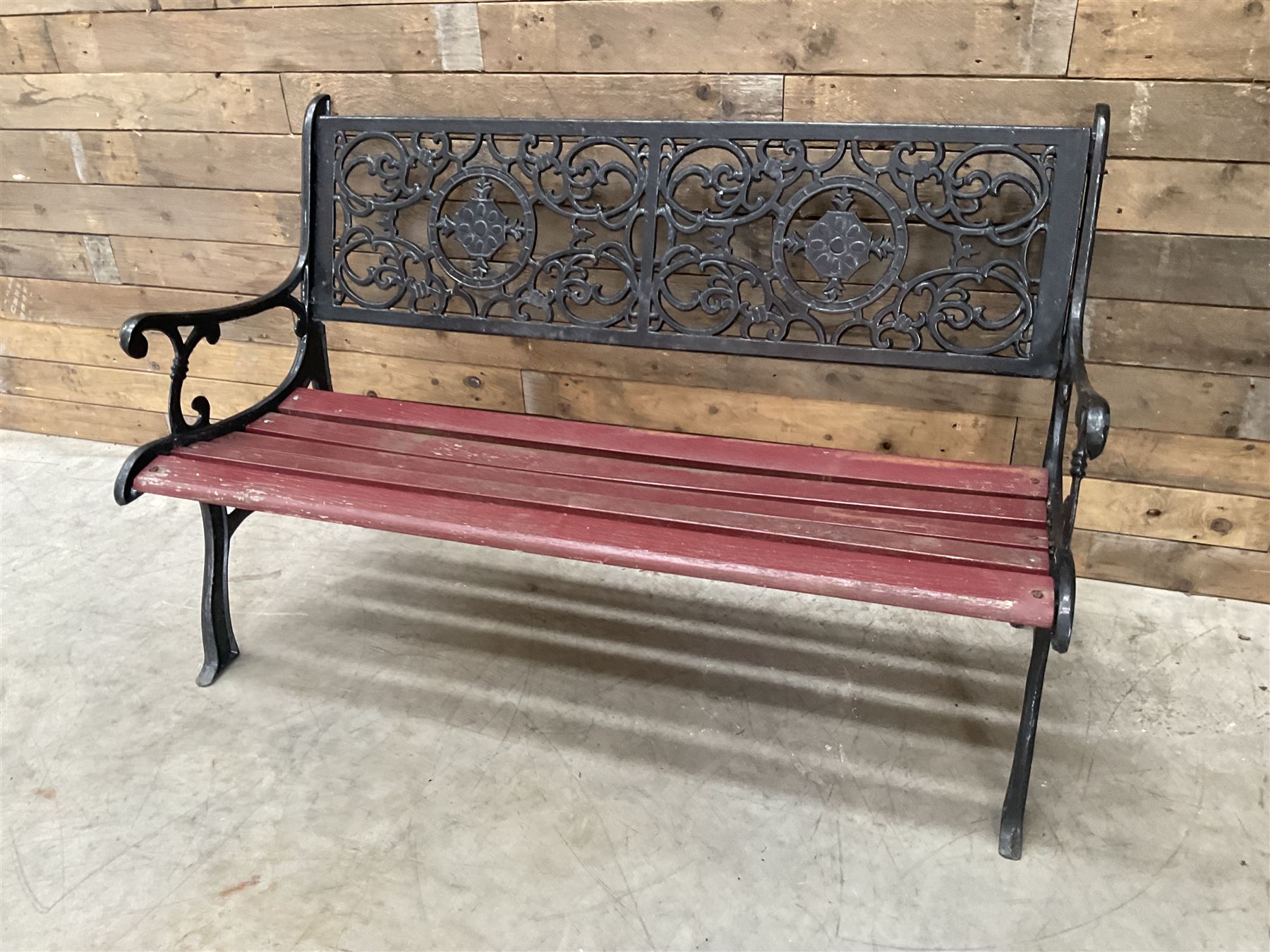 Cast iron and wood slatted garden bench