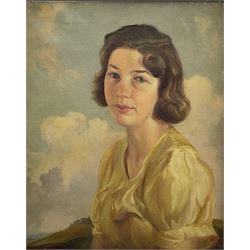 George P Mackeson (British exh.1929-1934): Portrait of a Young Woman in a Yellow Dress, oil on canvas signed and dated 1941, 50cm x 40cm