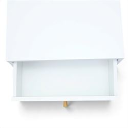 Contemporary pair of white single drawer bedsides, raised on tapering light wood supports