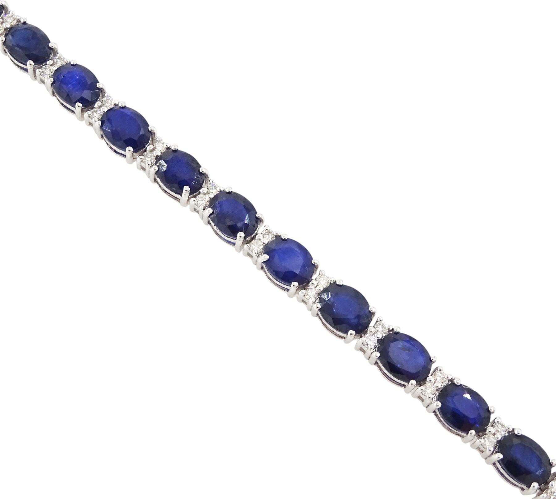 18ct white gold sapphire and diamond bracelet, twenty-six oval cut sapphires, each spaced by two round brilliant cut diamonds, stamped 750, total sapphire weight 10.60 carat, total diamond weight 0.46 carat