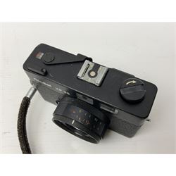 Three Rollei cameras, to include a Rollei 35 LED camera, with Triotar 3.5/40 lens and two Rollei XF 35 cameras, each with Sonnar 2.3/40 lenses