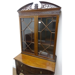  Edwardian Chippendale style mahogany cabinet, pierced swan neck pediment, two astragal glazed doors above serpentine moulded top, two drawers with blind fret work facias, on square tapering supports with spade feet, W78cm, H185, D42cm  