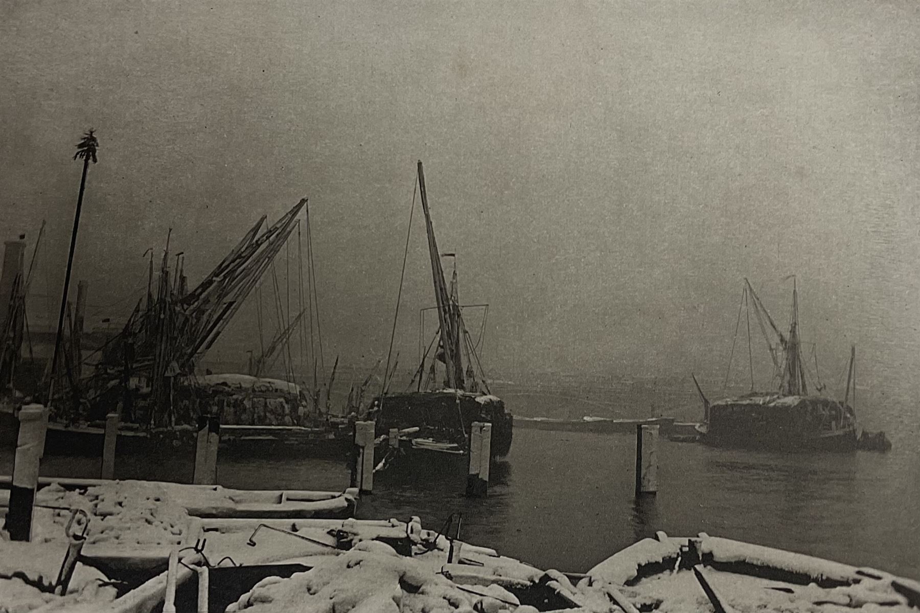 Frank Meadow Sutcliffe (British 1853-1941): 'Dinner Time' - Foulbriggs Field Lealholm Hall Farm, 19th century photographic print signed on the margin in pencil, with embossed border  15cm x 19.5cm; another similar mounted photograph of a Port scene (unframed) (2)
