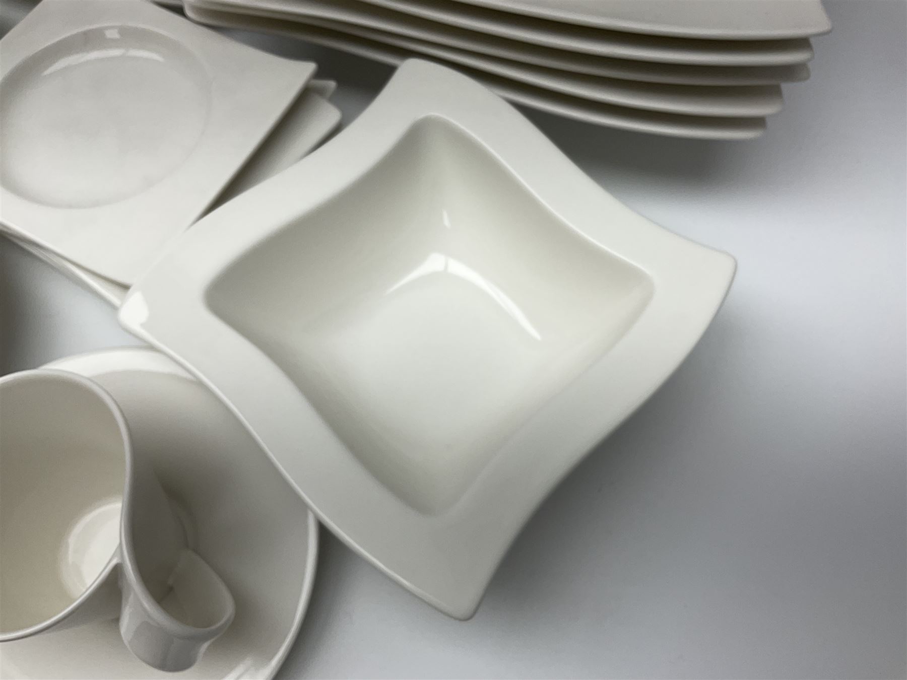 Villeroy & Boch New Wave pattern dinner and tea service for five people, comprising square dinner plates, rectangular dinner plates, pasta bowls, cereal bowls, coffee cups and saucers, side plates and dessert plates, all with printed mark beneath