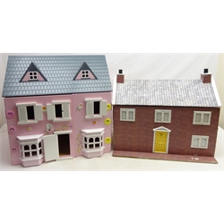  Two modern dolls houses, H62cm maximum and a quantity of dolls furniture including traditional style furniture, Rosebud wooden sets, bus & accessories in five boxes  