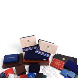 Large quantity of empty Royal Mint and Westminster coin cases, two part-filled First National Coinage of Barbados proof sets, pre-decimal coins, commemorative crowns, small group of ancient coins, Pobjoy Mint velvet bags, Hattons of London gloves, coin capsules, etc
