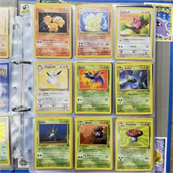 Collection of approximately 400 Pokemon trading cards, mostly 1999 Wizards Pokemon cards to include 1st Edition Dark Gyarados holo 8/82, Dark Charizard 4/82 holo and 21/82 non holo, Dark Blastoise 3/82 holo and 20/82 non holo, Dark Raichu holo 83/82, Dark Dragonite 22/82, eleven first edition cards, Japanese cards, Trainer cards, etc, together with an album of Pokemon the First Movie cards, a voice actor signed copy of Pokemon: The First Movie Animation Comics Mewtwo Strikes Back #1, 5305/8000 with certificate of authenticity with comics 2, 3 and 4 