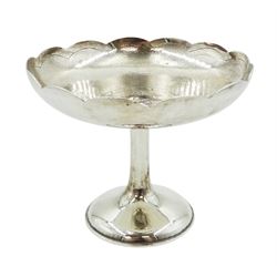 Late 19th/early 20th century Chinese export silver pedestal bowl, by Hung Chong of Canton & Shanghai, the circular dish with lobed rim, finely planished finish and central character motif, upon a stem and spreading foot, impressed beneath with initials HC and character mark, H8.5cm, approximate weight 4.34 ozt (135 grams)