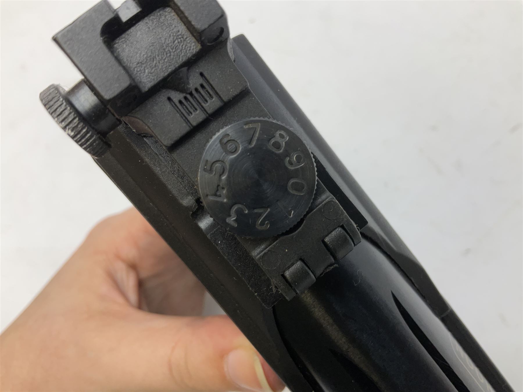 Webley Typhoon .22 air pistol, break barrel action with adjustable sight and sound moderator, serial no.1211 22509, in original box with instructions