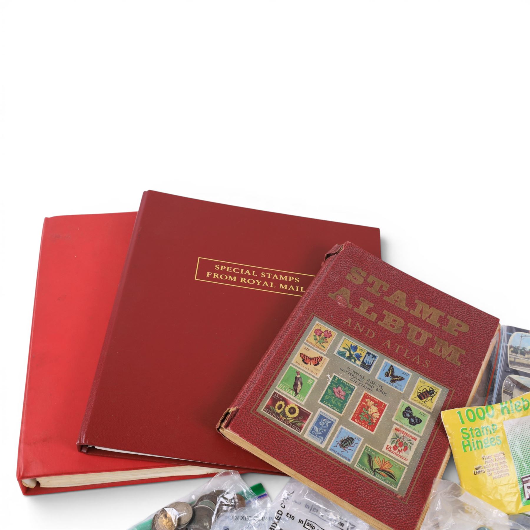 Great British and World coins and stamps, including commemorative two pound and fifty pences, commemorative crowns, loose stamps, etc, in one box